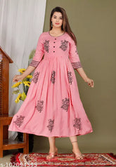 Stylish hand-blocked rayon kurti for women, effortless elegance, three-quarter sleeves, printed combo. Rayon kurti on model, size S (36in bust)