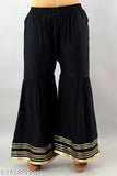 Women's viscose rayon kurta and sharara set in solid net, three-quarter sleeves. Indian clothing for women's fashion in sizes S-XXL