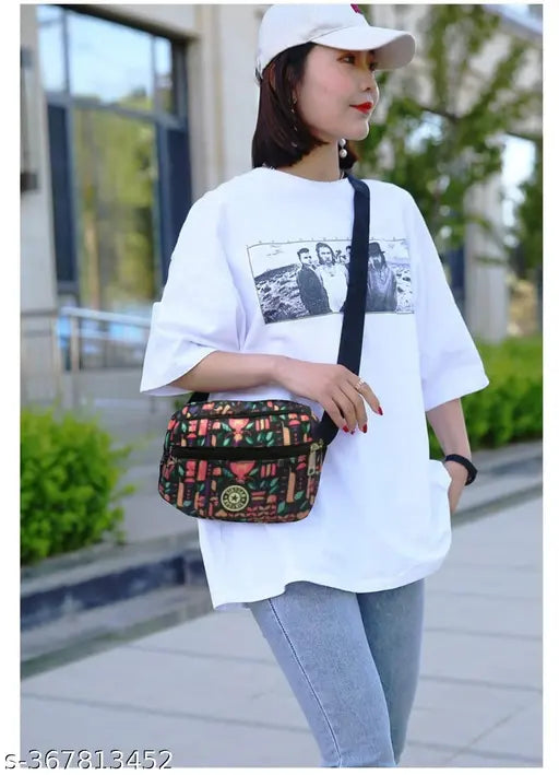 Medium pink nylon MOMISY shoulder cross body bag with adjustable strap, perfect for college outings and travel. Durable zippers, large capacity, and trendy fashion style