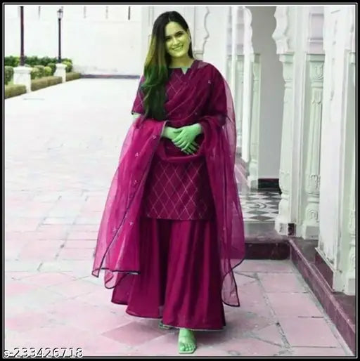 Women's rayon gold printed kurta with sharara dupatta set, three-quarter sleeves, vibrant Indian print on display. XS, S, L, XL, XXL, 4XL available. Made in India