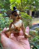 Brass modern Krishna idol, hand-painted with netr shringar and gold color, for pooja puja ghar temple decor. Indian religious figurine for Janmashtmi celebration, 8cm x 5cm x 8cm in size