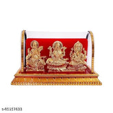 Golden plastic idols: Metal Lord Ganesh, Maa Lakshmi, Saraswati from India