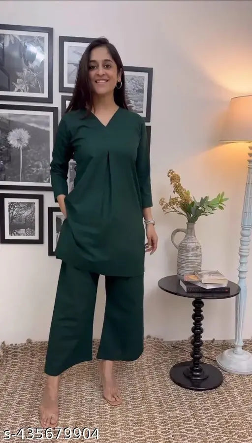 Green rayon kurta set with cotton palazzos, black color, three-quarter sleeves, for women and girls