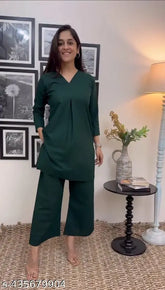 Green rayon kurta set with cotton palazzos, black color, three-quarter sleeves, for women and girls