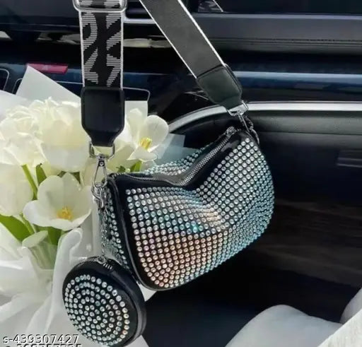 Blue PU rhinestone sling bag (2 compartments, embellished net pattern), detachable pouch and adjustable strap. Premium quality fabric with heavy-duty zips. Imported sling bag from China