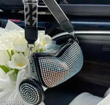 Blue PU rhinestone sling bag (2 compartments, embellished net pattern), detachable pouch and adjustable strap. Premium quality fabric with heavy-duty zips. Imported sling bag from China