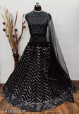 Black sequin embroidered Lehenga Choli with net fabric, traditional Indian party wear for festivals and weddings