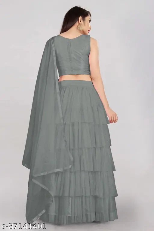 Embroidered satin lehenga set in net fabrics with ruffled bottom and lace dupatta, semi-stitched and alterable up to 42 inches, Indian origin