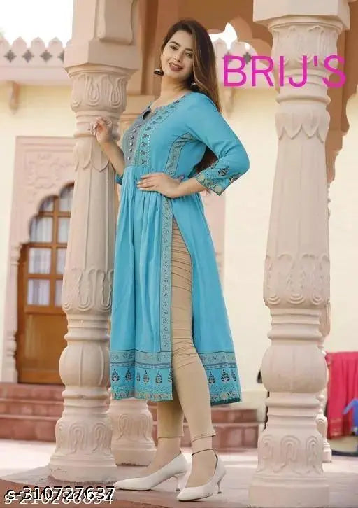 Rayon, long festive kurti in printed combo for girls and women with three-quarter sleeves. Double your fashion flair with this beautiful Indian Rayon kurti