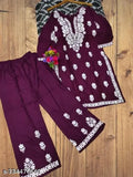 Embroidered rayon festive wear chikankari kurta with plazzo, three-quarter sleeves, Indian embroidery on display