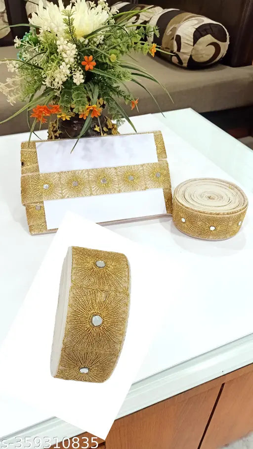 Gold color, embroidered net ribbon roll for Kurti, sarees, blouse, dress, lehenga, dupatta, choli, palazzo, Anarkali, and home decor. 5cm width, 9m pack