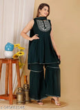 Green rayon kurta with sharara and dupatta set, embellished for festive and everyday wear
