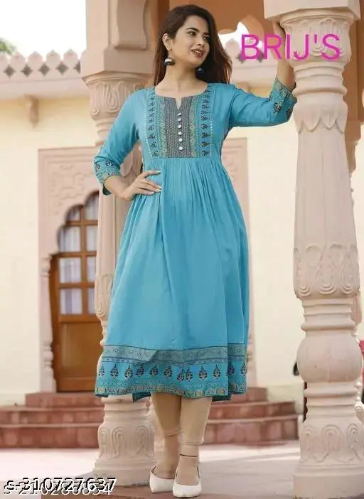 Rayon Festive Long Kurti, Alisha Fabulous design with three-quarter sleeves, perfect for girls and women. Indian printed Rayon kurti for partywear." (108 characters)