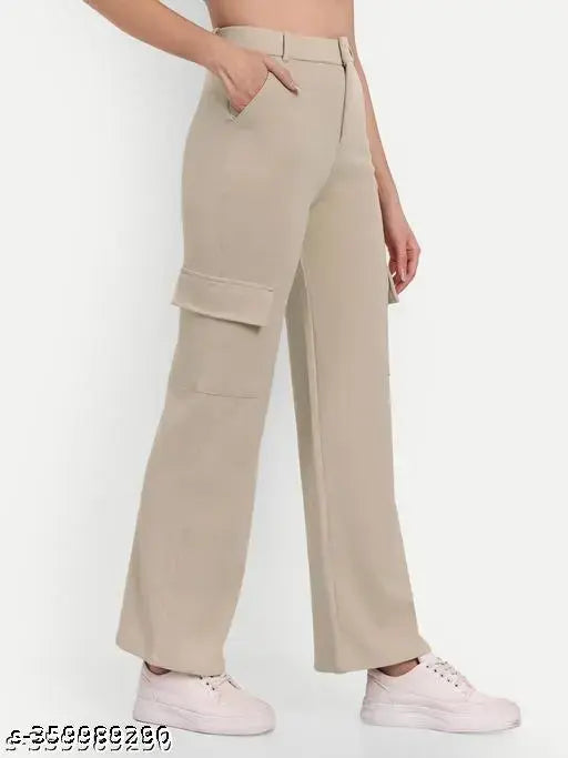 Cream viscose rayon high-rise cargo pants with slanted inset pocket and flap patch, suitable for both casual and formal wear