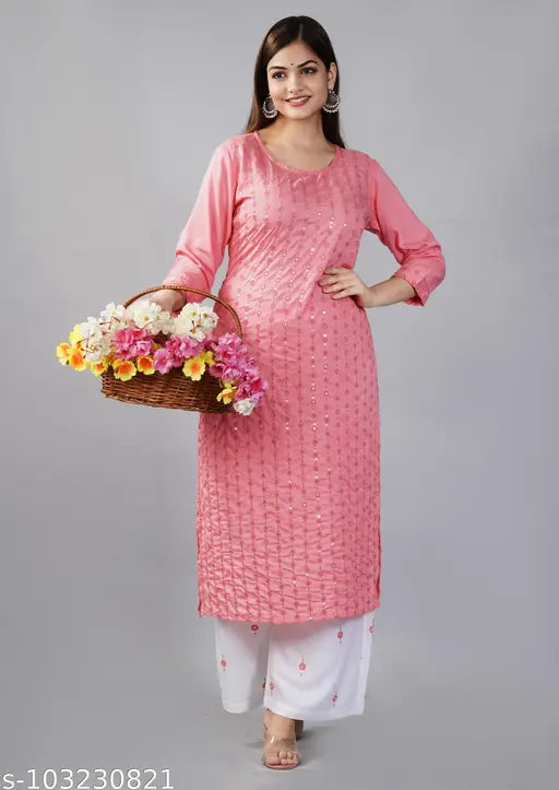 Rayon peach embellished kurta with palazzos, three-quarter sleeves and printed design, Indian traditional wear for women