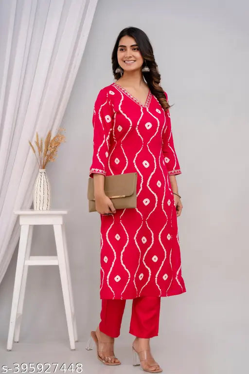 Pink rayon polka dot kurta for party wear, three-quarter sleeves, printed combo. Close-up on vibrant Indian fashion
