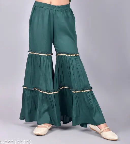Girls Rayon Printed Kurta and Sharara Set - Indian A-line outfit with V-neck, sleeveless design, featuring Bandhani print and lace work. Perfect for parties, weddings, or festivals