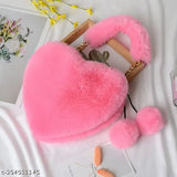 Synthetic faux fur heart-shaped sling bag with pompoms, suitable for various occasions. Soft and lightweight, ideal for everyday essentials. Imported from India