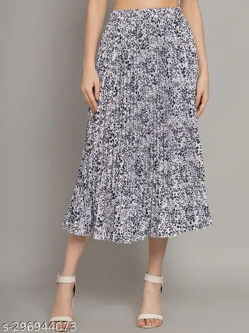 Printed net pleated midi skirt, stretchy and elastic for women's fashion. Polyester, A-line design, suitable for various occasions. Indian-made, available in sizes S-XXL