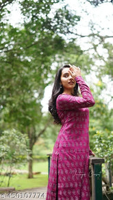 Pink viscose rayon kurti with matching pants, printed net pattern for women" (108 characters)