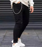 Plain black cotton blend jeans for men, SDK2OFK style on display