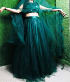 Green jute and silk lehenga-choli with embroidered top and solid net bottom, paired with an embellished net dupatta. Semi-stitched size: 38m/38in, 42m/42in, 2.5m/2.5in; free size available. Origin: India