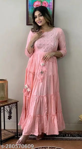 Pure top trending Lurex long peach cotton blend gown, embroidered three-quarter sleeves, women's ethnic wear on mannequin