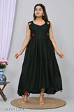 Black rayon blend anarkali gown, solid design with cotton lace trim and contrast tassels, Indian geometrical pattern flared dress for women