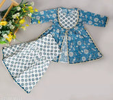 Floral printed cotton baby girl kurti sharara set in vibrant colors, soft and comfortable, with gota patti and dori details. Indian festival wear