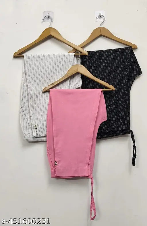 Cotton pants combo for women - Solid black, white, pink, 3-pack. Women's casual pants set with side pockets. Latest fashion trend from India