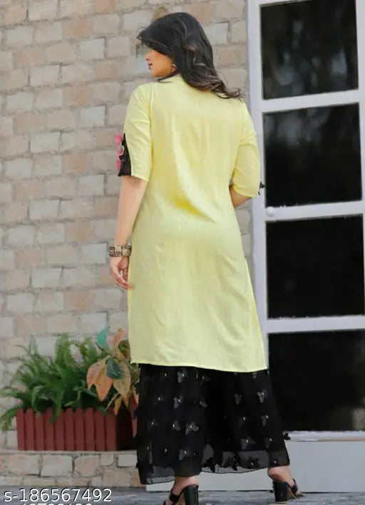 Yellow Rayon Kurti Sharara Set: Solid design, three-quarter sleeves, pack of 2 in various sizes (M, L, XL, XXL), featuring handwork on the kurti yoke and net on shararas, Indian origin