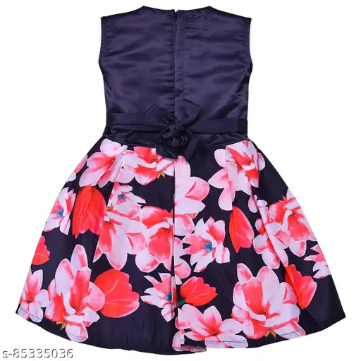 Navy blue satin sleeveless Silver Kraft baby girl's dress on hanger, printed net pattern