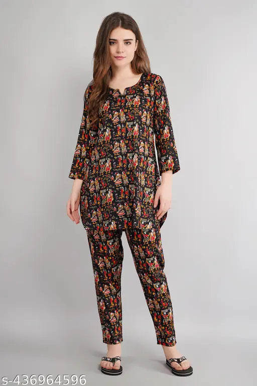 Beautiful printed rayon night suit for women and girls, featuring three-quarter sleeves and various sizes from S to 4XL. Made in India