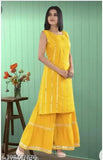 Rayon yellow marigold kurta with sharara bottom, sleeveless design by T R Creation for Indian events
