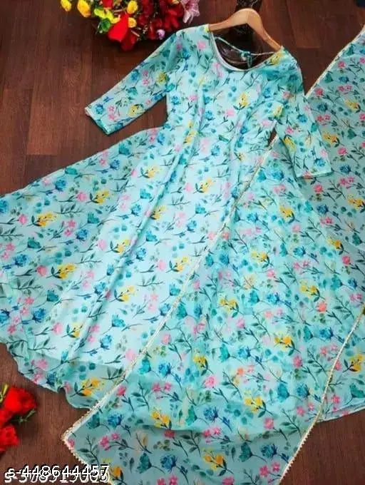 Blue designer Georgette gown with heart print, perfect for weddings and parties. Indian fashion, romantic style." (125 characters)