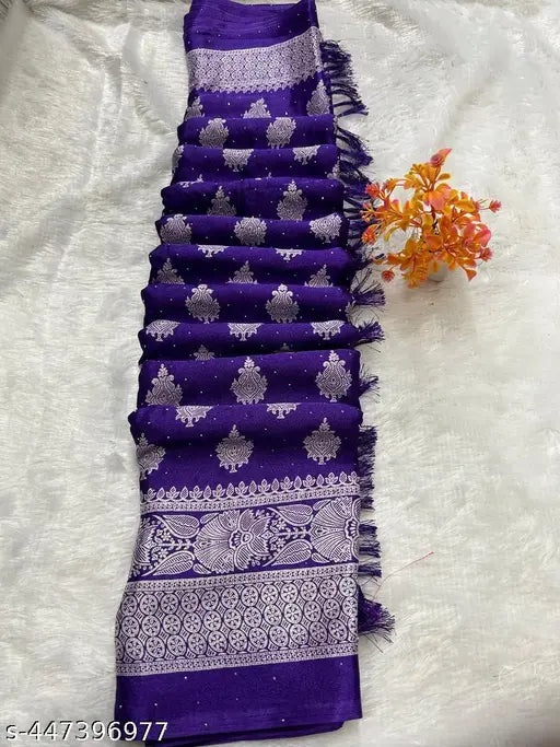 Embellished muslin saree with solid net blouse, traditional Indian attire