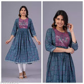 Viscose Rayon Embellished Nyra Kurti, blue, India - Women's three-quarter sleeve summer wear with bandhani print and embroidery work on neck