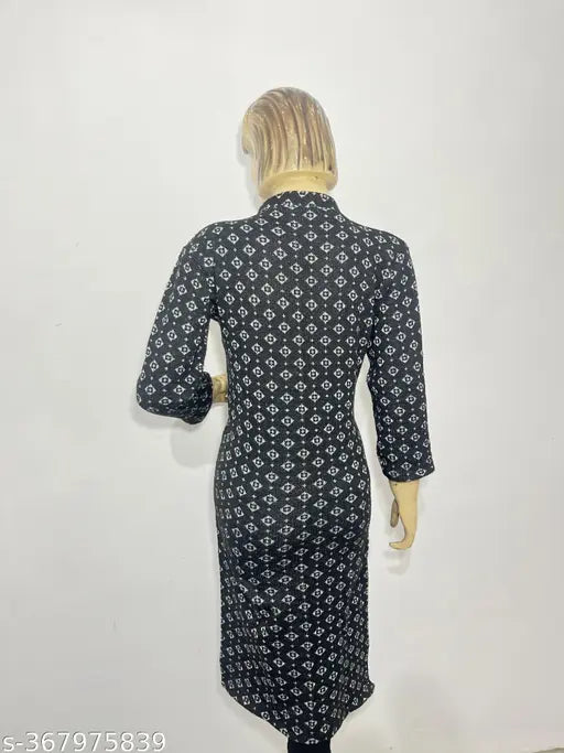 Black woolen kurti with floral print, three-quarter sleeves. Ultra-soft, warm, and versatile for festive occasions