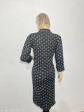 Black woolen kurti with floral print, three-quarter sleeves. Ultra-soft, warm, and versatile for festive occasions