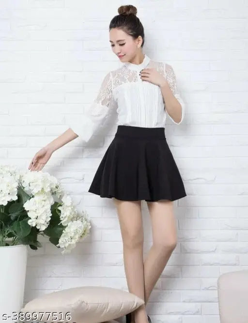 Black pleated polyester mini skirt for women, solid design, size 26-30