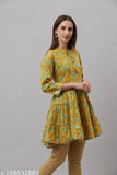 Mutard cotton blend women's round neck tunic, 3/4 sleeves with printed net embellishments. Product in size N, made in India