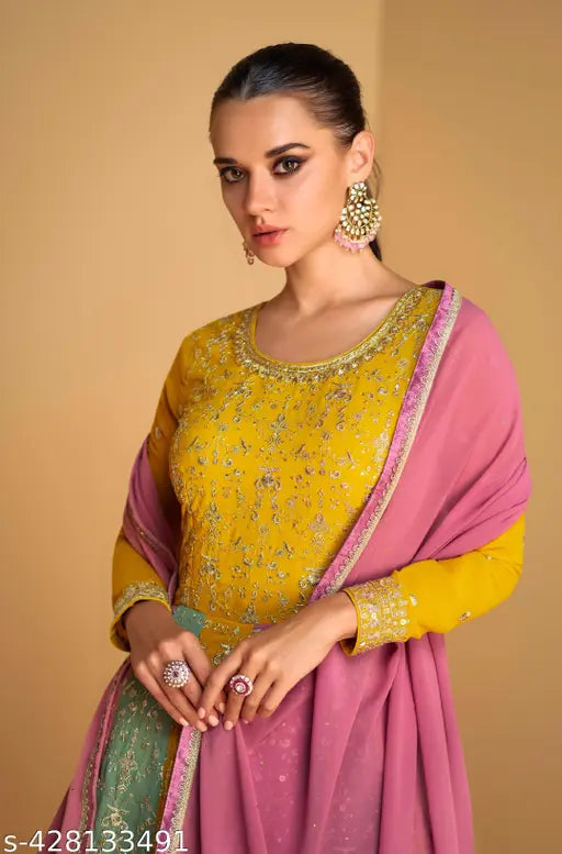Yellow, green, and pink embroidered Georgette gown with Santoon inner and faux Georgette dupatta, perfect for every occasion