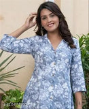 Aqua blue rayon floral printed nightsuit with three-quarter sleeves, suitable for lounging and sleeping. Indian origin." (108 characters)