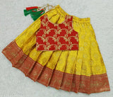 Art Silk baby girl's Pattu Pavadai lehenga choli dress, woven design on jacquard fabric. Sleeveless, available in sizes 6-12M to 7-8Y from India