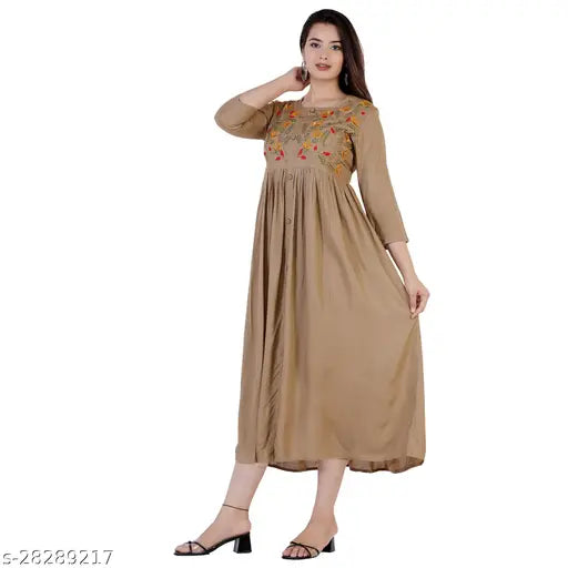 Beige rayon embroidery kurti with flared design, three-quarter sleeves, Indian handcrafted fashion