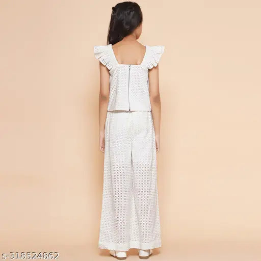 White cotton Schiffli embroidered cuff sleeve top and elasticated pant set for girls, self-design with sleeveless, single quantity in sizes 6-7 years, 7-8 years, 8-9 years, 9-10 years, 10-11 years, 11-12 years. India origin