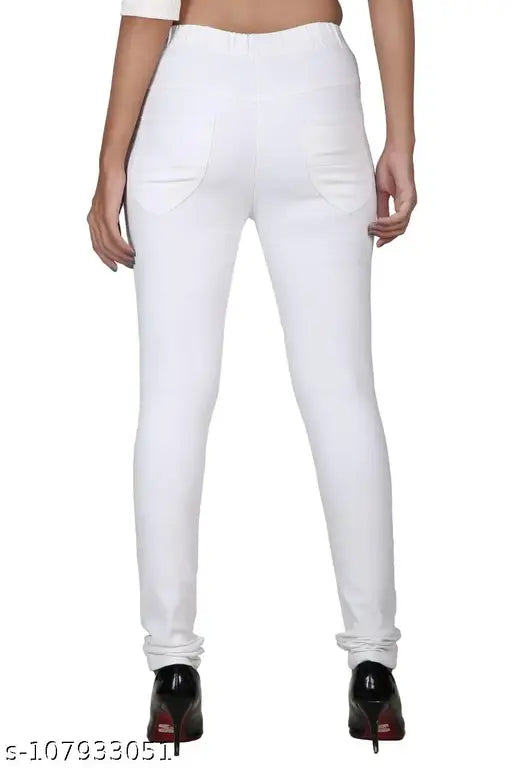 Solid white plus size denim Lycra jeggings for women, stretchable and high rise. Perfect for a stylish fit with a crop top or jacket. Available in sizes 44, 46, 48, 50, 6XL, 7XL, 8xl, and 9xl (country of origin: India)