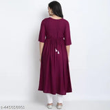 Rayon embroidered A-line kurta, solid combo, three-quarter sleeves. Indian fashion on model