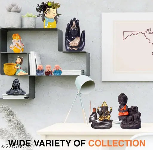 Black handcrafted zig-zag polyresin Buddha showpiece for home decor, office or study table - artful piece from Ashi Enterprises (India)