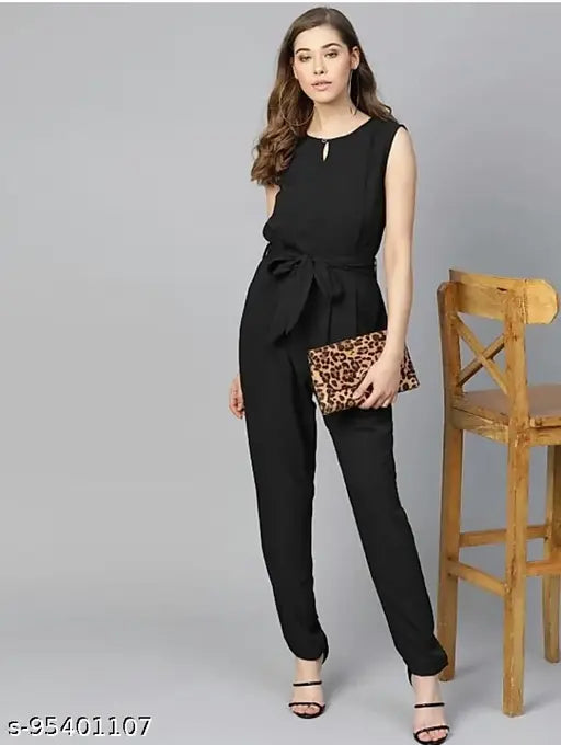 Black sleeveless jumpsuit for women, black formal wear on model standing pose, sizes XS - XXXXL